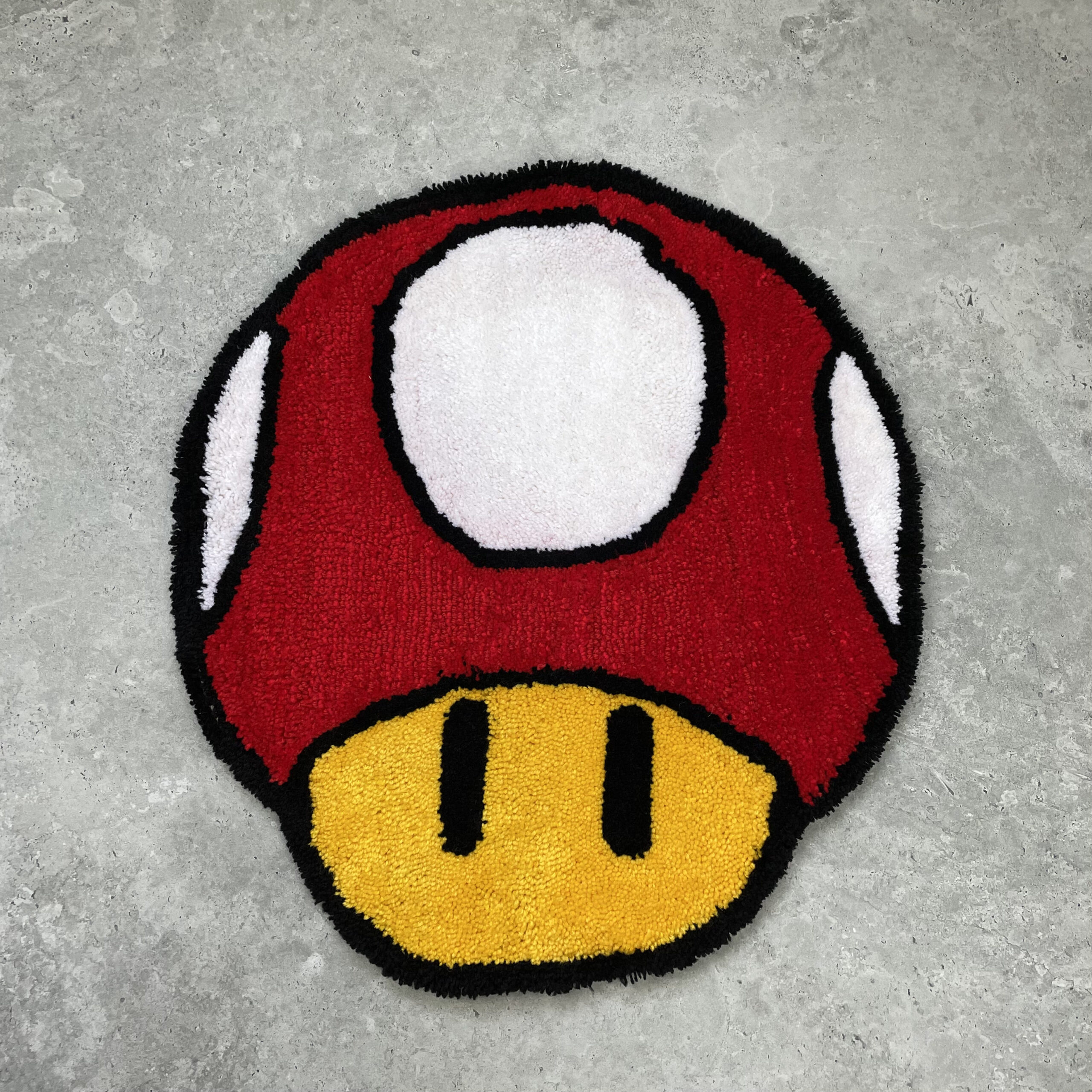 Ręcznie tworzony dywan – Mario Grzyb