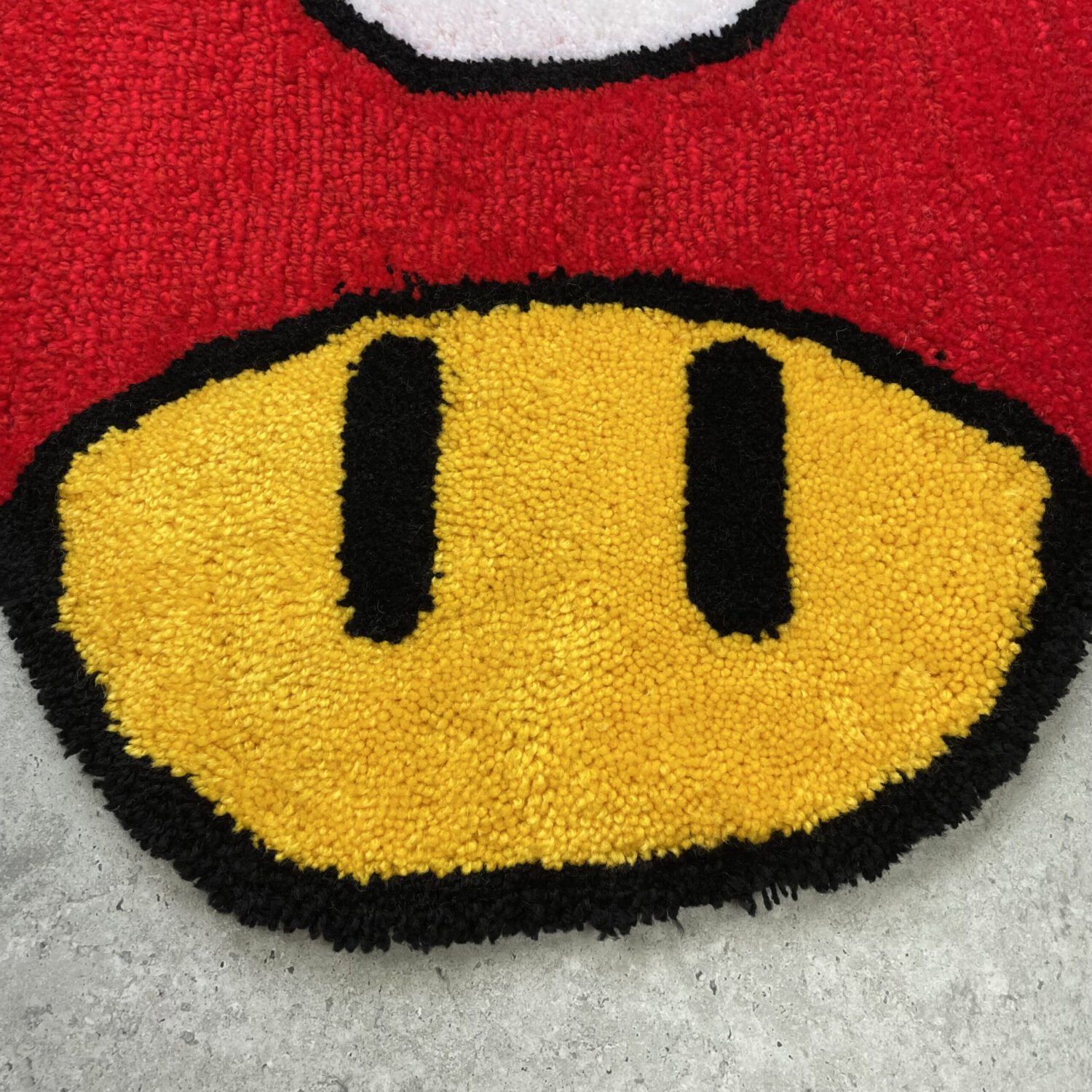 Ręcznie tworzony dywan – Mario Grzyb